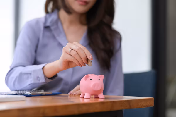 How to manage debt and savings UK